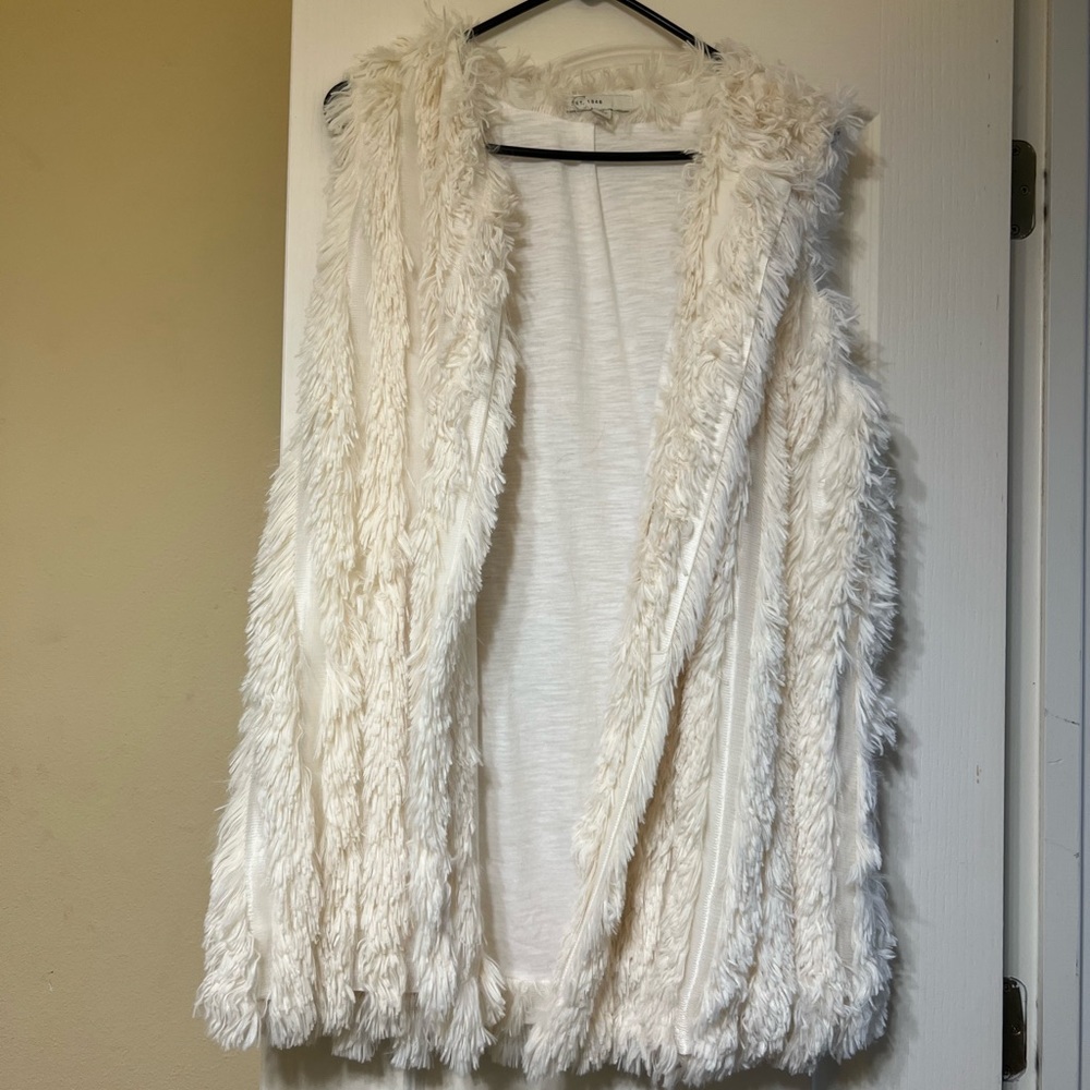 Cute fluffy vest!